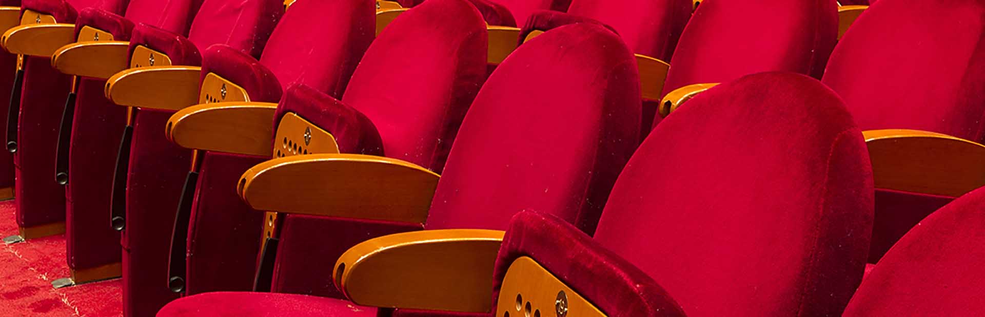 Red chairs in an empty theater