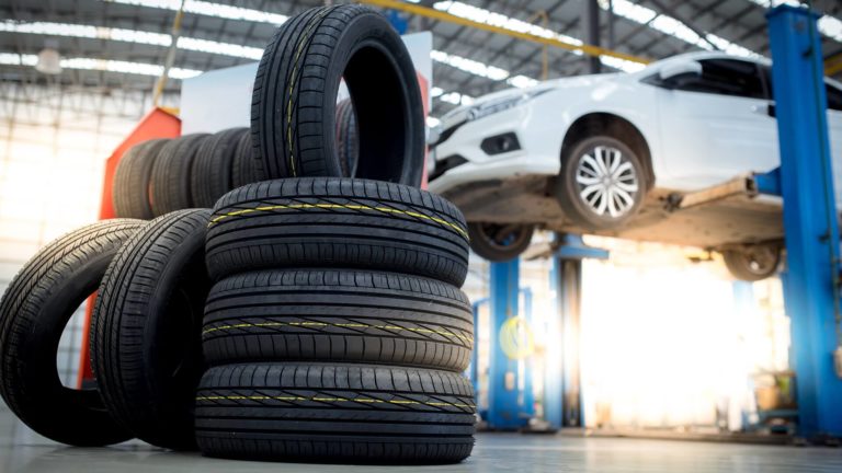 Auto Shop Liability & Defective Tires: A car having its tires replaced at an auto shop