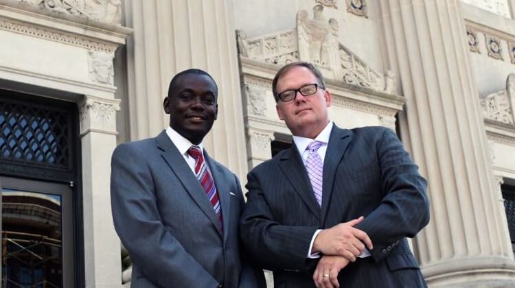 Kendall Dunson and Mike Andrews outside courthouse after Volkswagen verdict