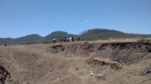 Beasley Allen attorney Mike Andrews stands on the side of the crater left from the impact of Ethiopian Airlines Flight 302. The plane penetrated 45 feet into the ground on impact