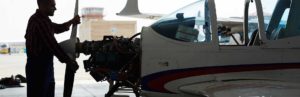 Small plane undergoes repairs in a hangar