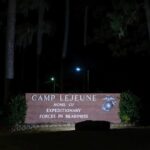 Camp Lejeune Marine Base sign at night