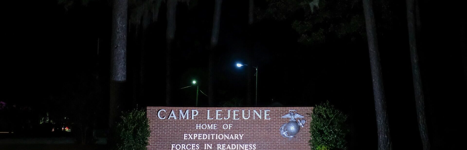 Camp Lejeune Marine Base sign at night