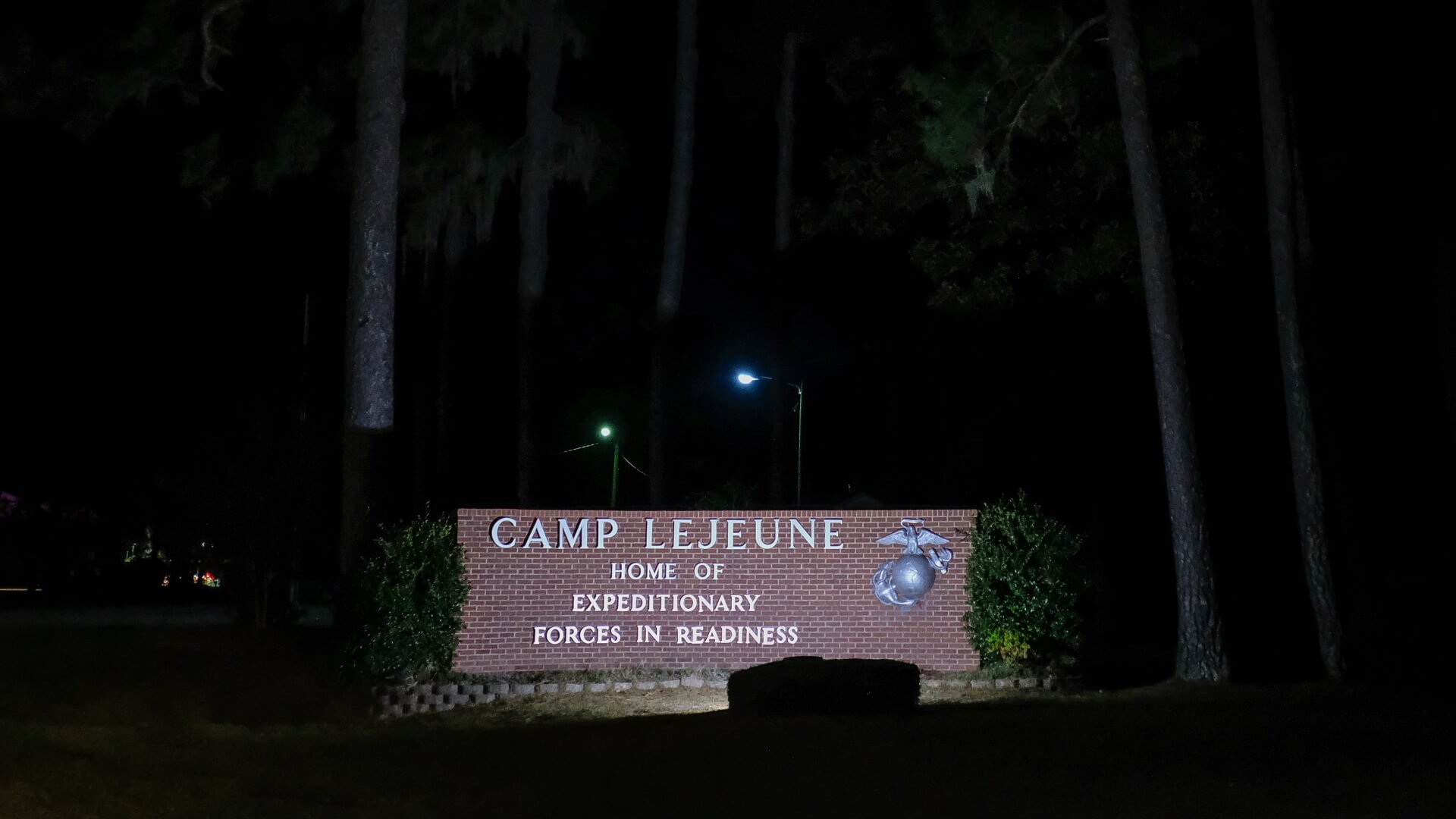 Camp Lejeune Marine Base sign at night