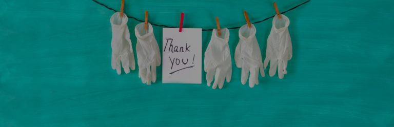 Sterile gloves hung up with a 'Thank you!' note