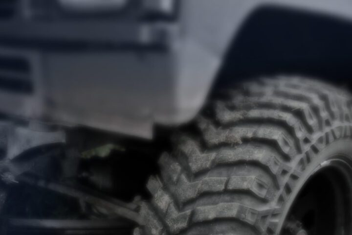 Close up on a vehicle "boosted" with a lift kit