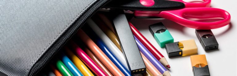 JUUL vaping device hidden among school supplies