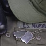 Folded Marine Uniform, boots and dogtags