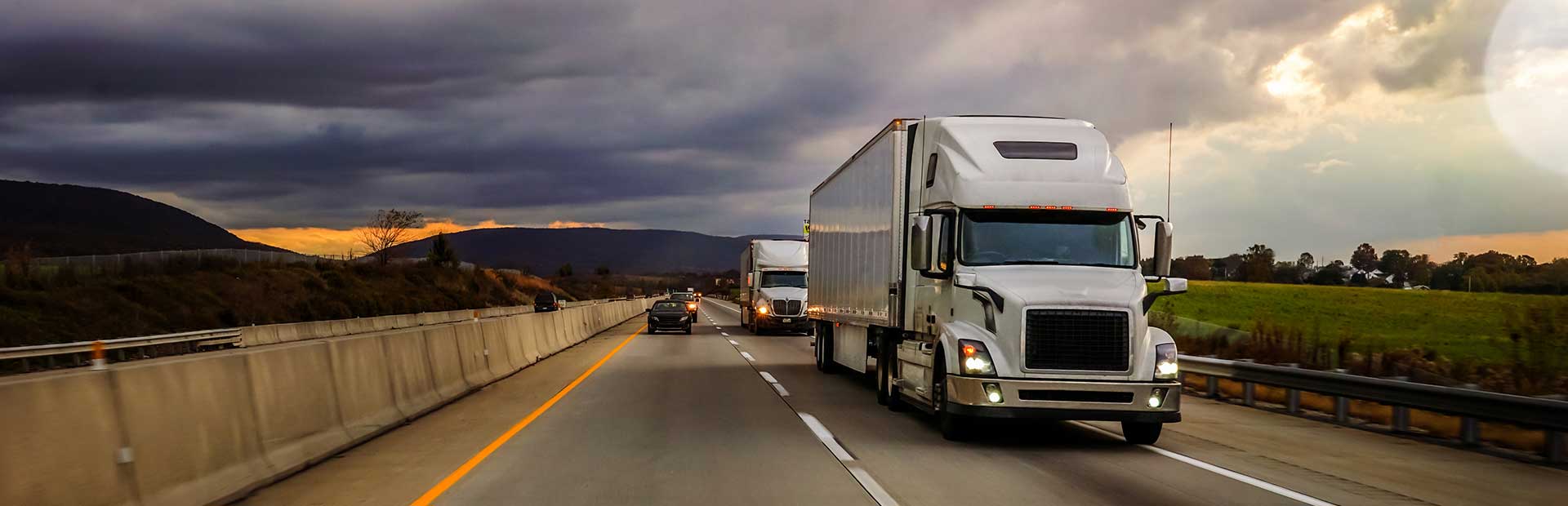 Commercial Trucks driving on the the highway