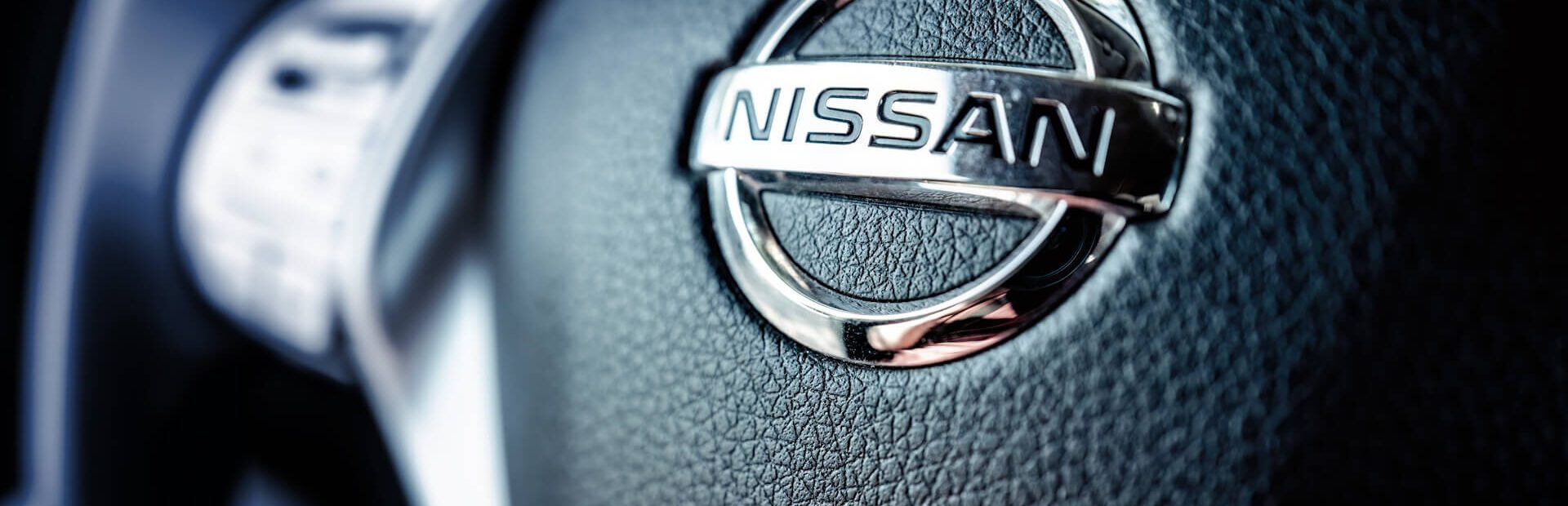 Close up of a Nissan Rouge steering wheel