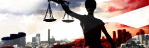 Lady justice against American flag backdrop