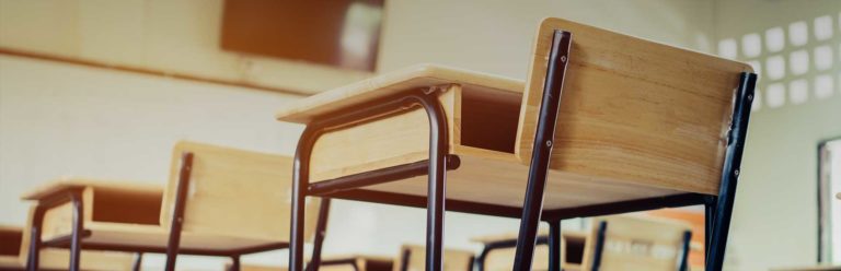 School desks in a classroom