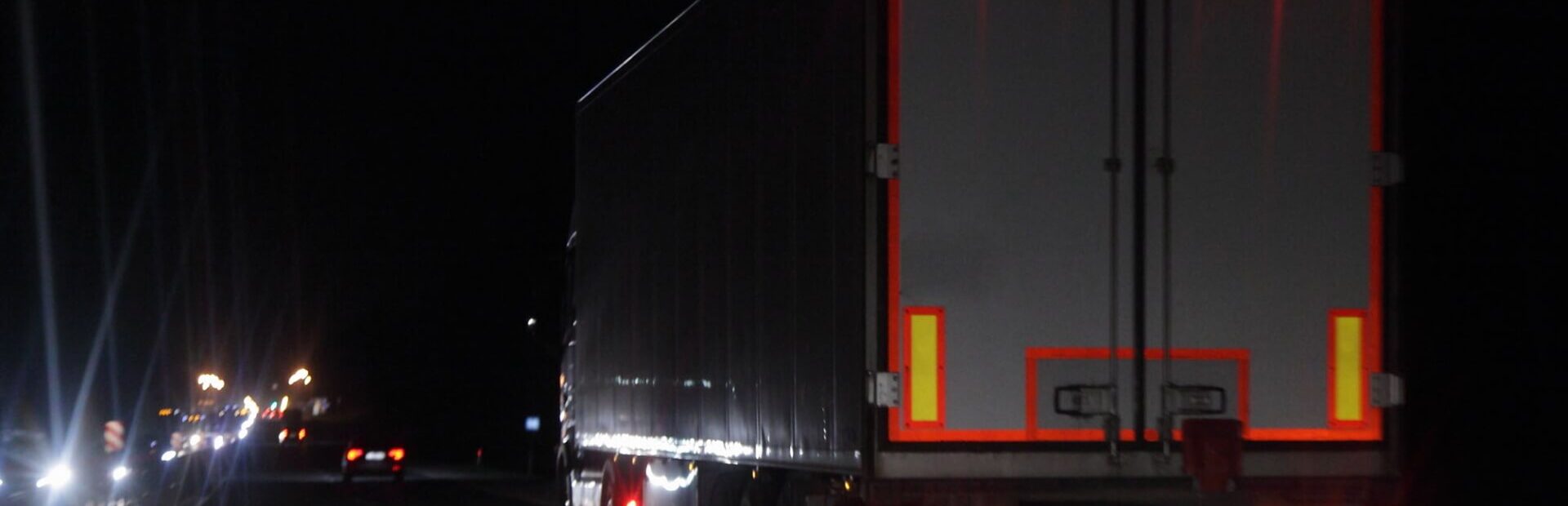 Commercial vehicle on the road at night